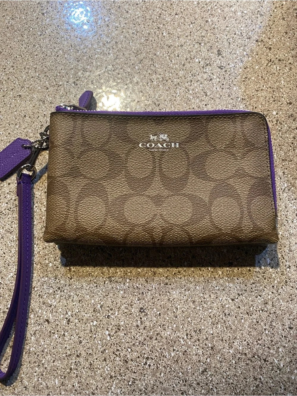 Coach Brown Signature Canvas Wristlet with Purple Trim